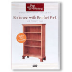 BOOKCASE WITH BRACKET FEET WITH PHILIP LOWE DVD